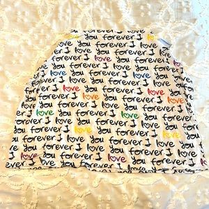 Canopy Couture infant car seat and nursing cover.